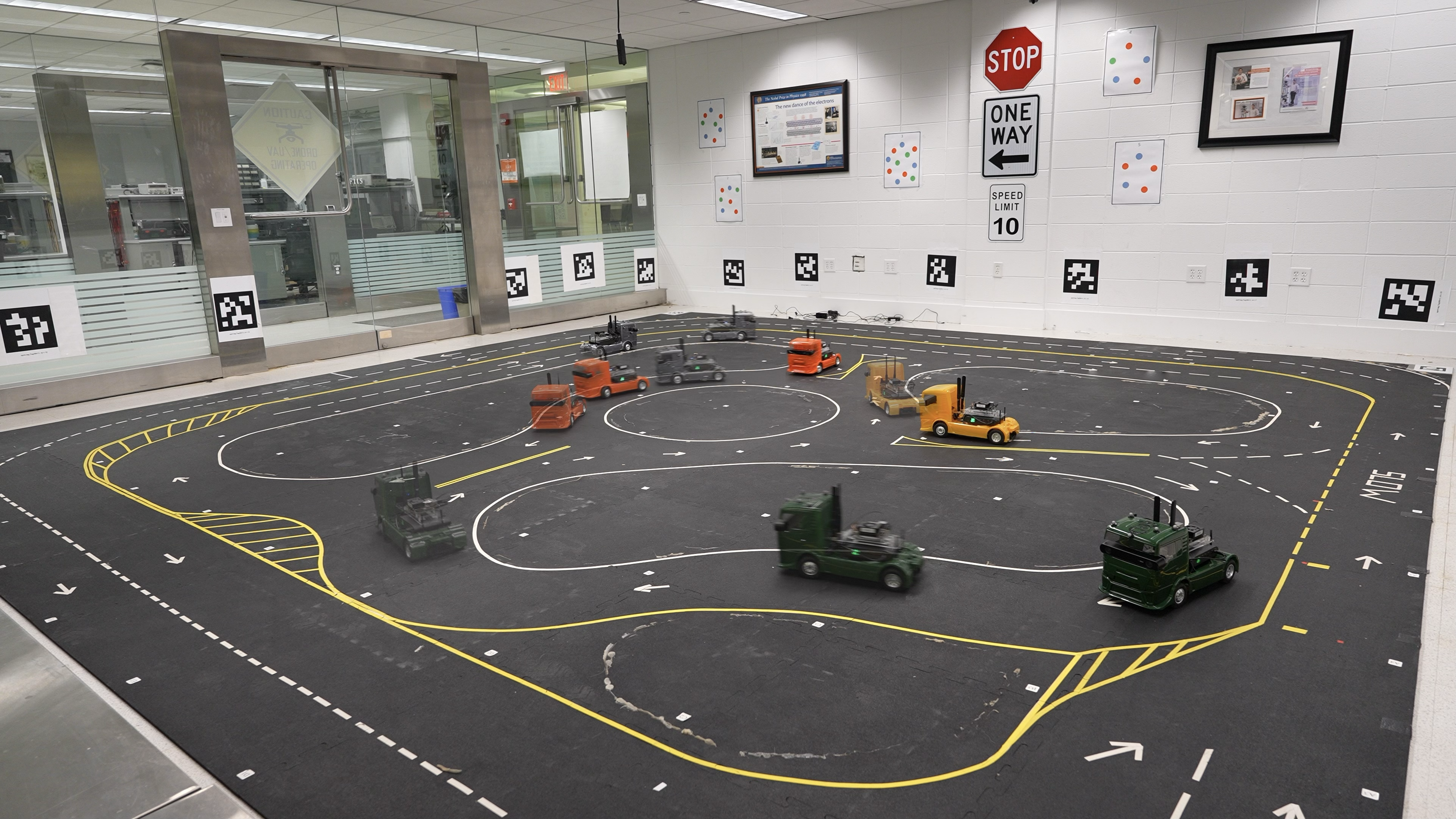 [RSS'24] Who Plays First? Optimizing the Order of Play in Stackelberg Games with Many Robots